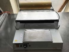 A commercial sink wrap machine