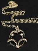 A vintage 9ct gold pearl pendant on chain