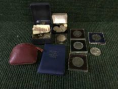 A box of assorted foreign coins and notes, commemorative coins,