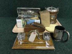 An Edwardian oak desk stand, biscuit barrel, Army torch in leather pouch, hand mirror,