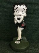 A cast metal Betty Boop door stop