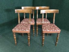 A set of four mahogany dining chairs