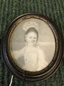 A miniature pencil portrait of a girl, bears signature H.