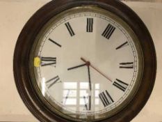 An early 20th century school clock fitted with a later movement