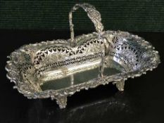 An ornate pierced silver basket, Richard Martin & Ebenezer Hall,