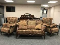 A Barker & Stonehouse three piece carved mahogany lounge suite comprising of two seater settee with