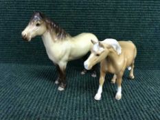Two Beswick figures - Highland pony Mackioneach model 1644, Dun gloss, together with Appaloosa pony.