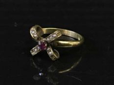 A ruby and seed pearl ring stamped 9ct, 2.