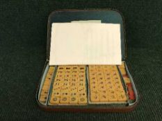 A cased Mah Jong set