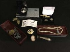 A box of silver jewellery - fish pendant, badge etc,