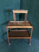 A mid 20th century teak trolley and musical jewellery table