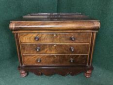 A Victorian mahogany four drawer chest