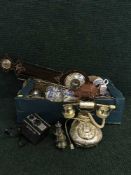 A box of blue and white dinner ware, cameras, barometer,