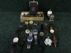 A box of coins, gent's wrist watch,
