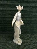 A Lladro figure - girl with basket