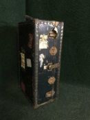 An early 20th century metal bound trunk,
