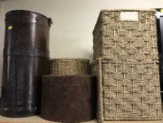 A leather stick pot, a suede lidded box,