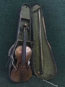 An antique violin and bow in case