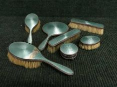 Seven piece silver and enamelled dressing table set