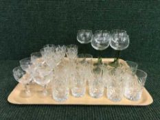 A tray of lead crystal and etched glass