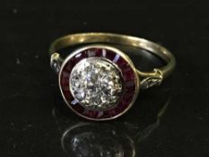 An Art Deco 18ct gold diamond and ruby set cluster ring