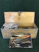 A metal bound tool box and assorted hand tools,