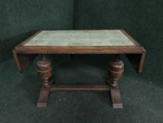 An oak tiled topped coffee table