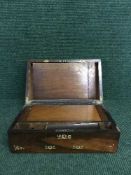A Victorian inlaid rosewood writing box