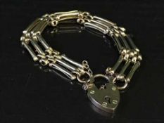 A 9ct gold padlock bracelet, 13.