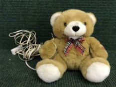 A talking teddy bear telephone receiver