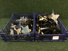 A box and two crates of die cast and plastic aeroplanes
