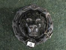 A cast metal Lion mask door knocker
