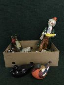 A box of clown figure, duck ornaments, hip flask, Jasperware lighter,