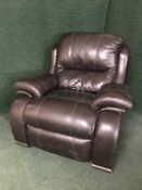 A brown leather Lazy Boy armchair
