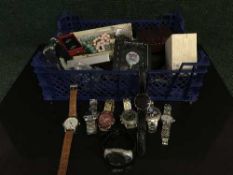 A basket of assorted wrist watches, pocket watches, costume jewellery,