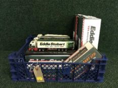 A box of eleven Eddie Stobart die cast vehicles