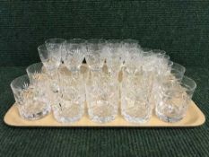 A tray of whiskey tumblers,