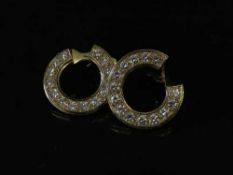 A pair of 18ct gold and diamond set hoop earrings
