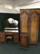 A six piece walnut bedroom suite