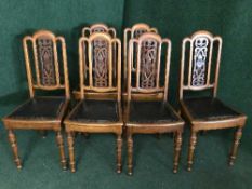 A set of six late 19th century carved mahogany dining chairs