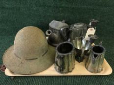 A tray of WW I helmet, plated ware,