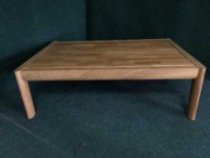 A late 20th century teak coffee table