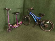 A boy's mountain bike and a Razor electric scooter