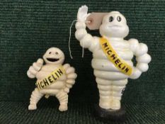Two Michelin cast metal money banks