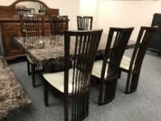 A Barker & Stonehouse high gloss marble dining table and six chairs