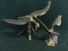 Two large brass eagle ornaments