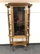An unusual mahogany glazed display cabinet