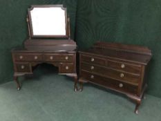 A mahogany dressing table and matching chest