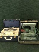 A cased Husqvarna electric sewing machine and Eltra reel to reel player