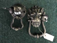 Two cast metal door knockers